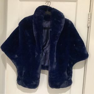 Beautiful faux fur shrug and coordinating earrings.